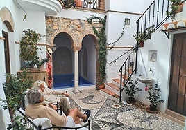 Benita and Sune in their patio.