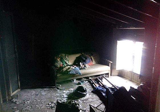 Becky and Andy Derrick's house after the fire in 2016.