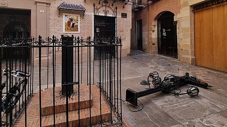 Historic cross toppled as tourists climb it to take holiday snaps in Malaga