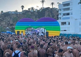 Thousands of revellers enjoy a beach party at last year's event.