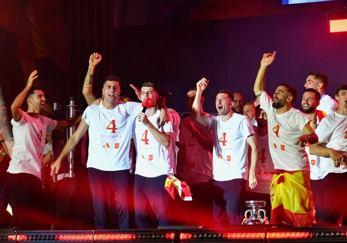 Rodrigo Hernández and Álvaro Morata celebrating the Spanish national football team's victory in the European Championship.