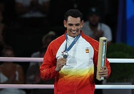 Ghadfa poses with his silver medal.