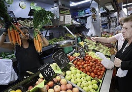 A fruit and vegetable stall in a Malaga market.