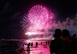 A moment from the opening fireworks display, watched by thousands of people on Malaga's city beaches.