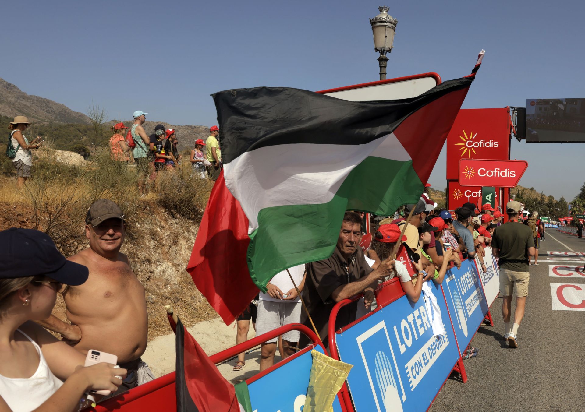 Vuelta a España pro cycle event races through inland Malaga towns and villages, in photos