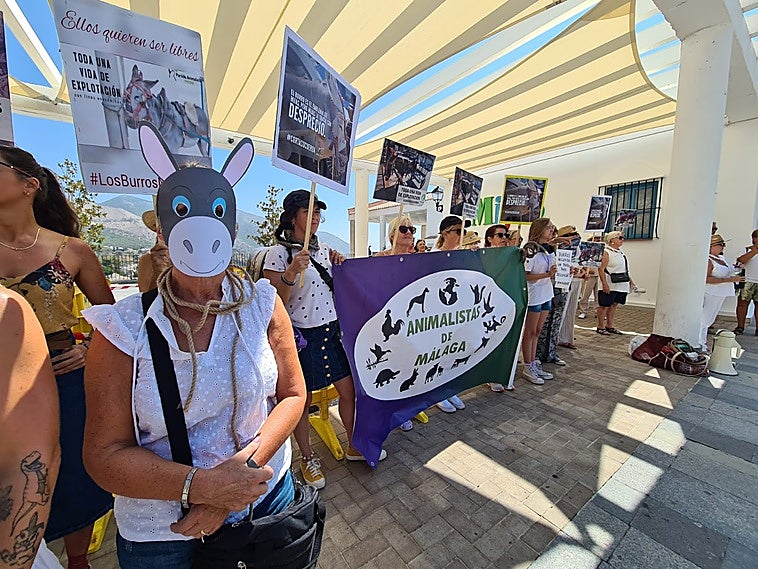 Protesters demand the end of the donkey taxi service for tourists in Mijas Pueblo.
