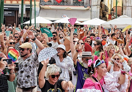 An international affair: tourists join in the fun at Malaga's summer fair