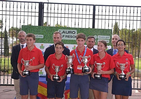The Vista Hermosa team holding their trophies.