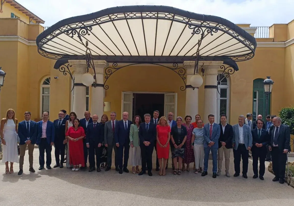 Participants in the historic meeting on the coastal train on 17 July.