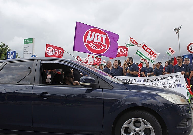 A motorist waits to gain access to the ITV premises on the Guadalhorce industrial estate in Malaga.