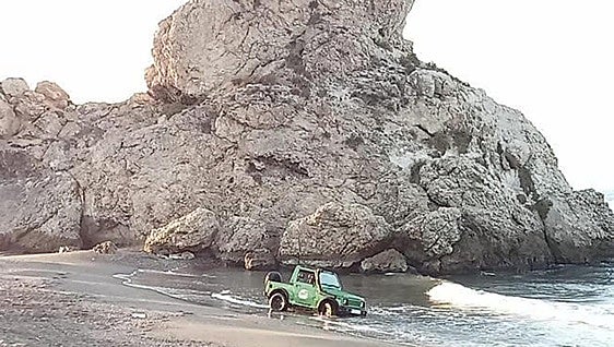 Mystery driver who was rescued from his vehicle after it became stranded in the sea on a Costa del Sol beach hands himself in