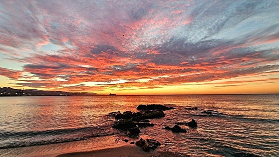 Autumn 'terral' paints a stunning sky at dawn on the Costa del Sol and across Malaga