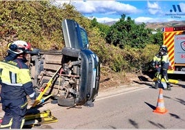 Firefighters at the scene of the accident on Thursday.