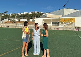 Ana Mata (c) visits the football ground.
