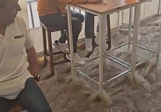 Still from the video recorded in Prado del Rey as the rainwater poured through the bar.