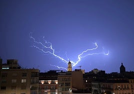 Lightning strike over Malaga city, with the Cathedral in the background.