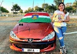 Ania Santos with her car after winning one of the events.