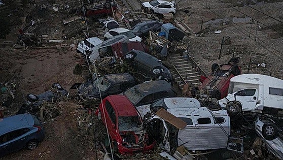 Woman miraculously pulled alive from car after being trapped for three days since flash flooding hit Valencia