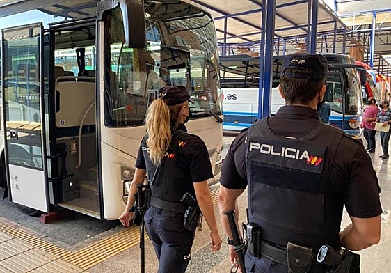 File image of National Police officers at Malaga bus station.