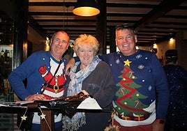 The charity's founder, Fabienne Paques (c), at last year's Christmas dinner.