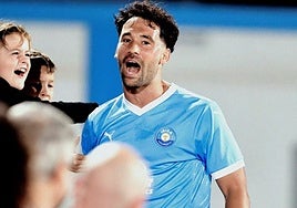 Quique González celebrates scoring Ibiza's first goal.