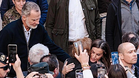Spain's King and Queen return to 'Dana' disaster zone for first time since officials were pelted with mud