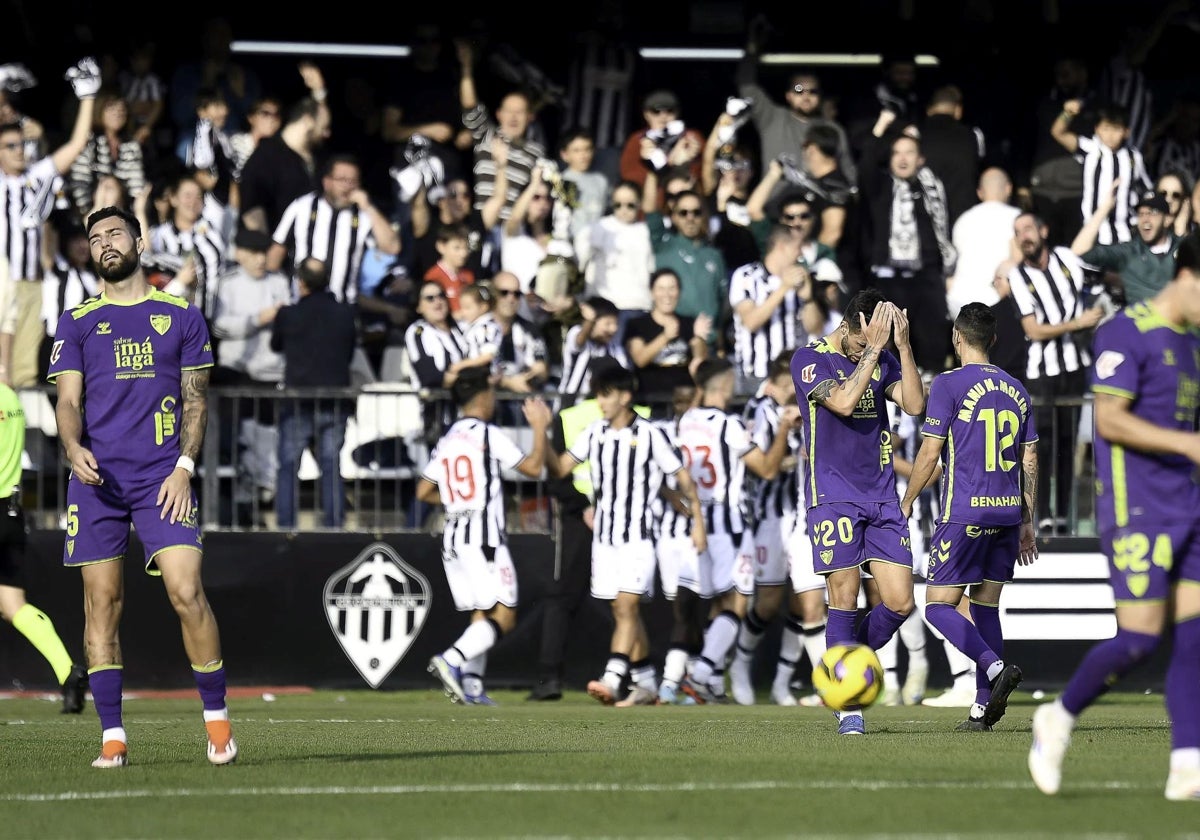 Álex Pastor and Nelson Montes after Castellón's second goal.