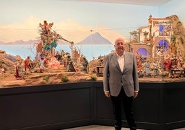 Antonio Díaz stands beside one of the nativity scenes that can be viewed in this unique museum in Mollina, near Antequera.