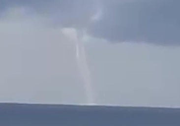This is the moment an impressive waterspout whipped up the sea between two popular holiday resorts on the Costa del Sol