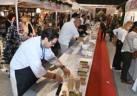 Sushi making, with a lot of care.