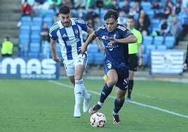 Goalscorer Fornés carrying the ball.