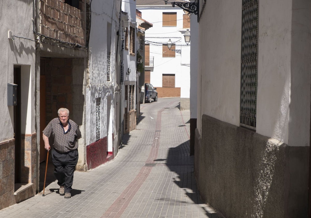 A resident walks in a municipality affected by a declining population.