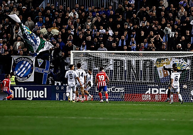 Griezmann, left, squeezed the ball in at the back post.