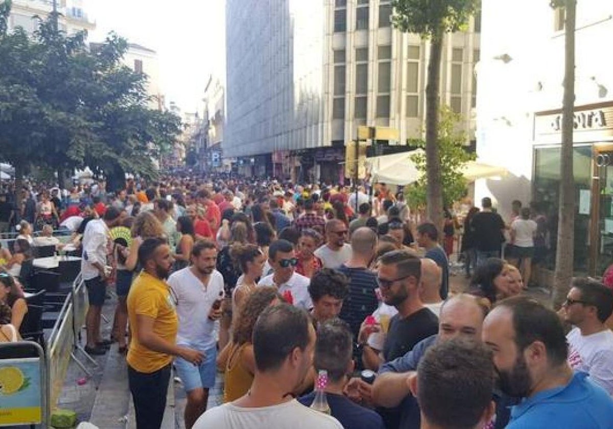 Botellón: open-air drinking in the city centre during Malaga's Feria.