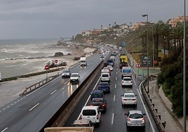Traffic tailback on the A-7 motorway towards Marbella due to the closure of flooded lanes near Mijas.