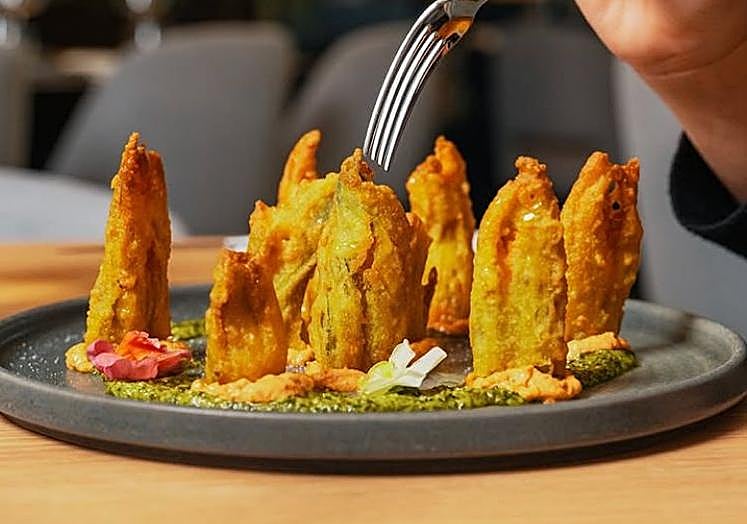 Crispy fried courgette flowers.