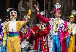 The groups are famed for elaborate costumes and witty lyrics.