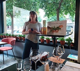 Sharon Page giving an olive oil tasting demonstration.