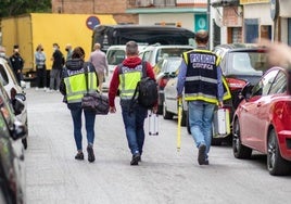 File image of police investigators.