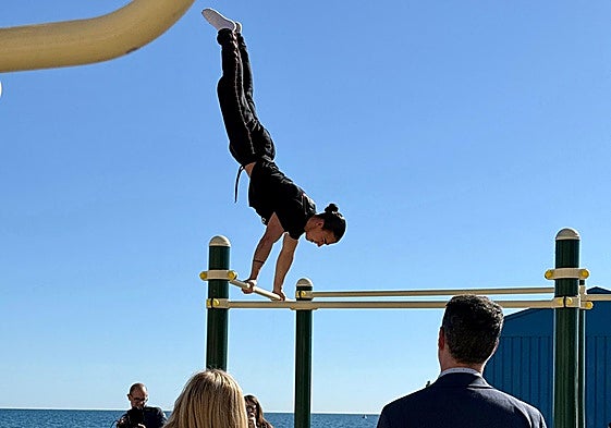 An athlete exercises in the calisthenics area.