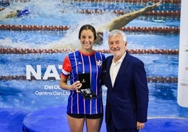 De Valdés with one of her two medals.