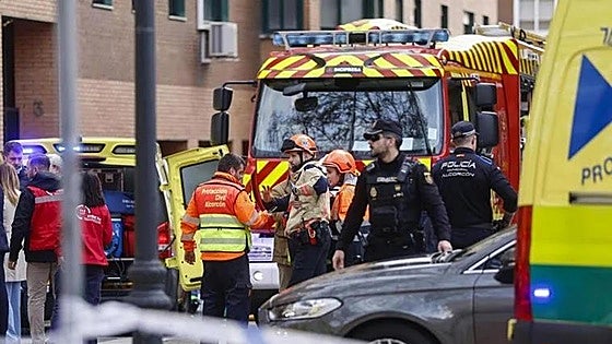 Two firefighters dead and more than a dozen others affected by fumes during huge blaze at community garage in Spain