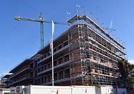 Construction companies are having difficulty finding workers and are bringing in workers from other countries to meet the demand.