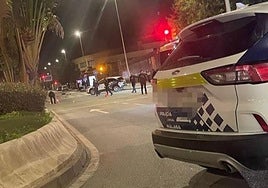 Police officers at the scene of the fatal accident on Friday night.