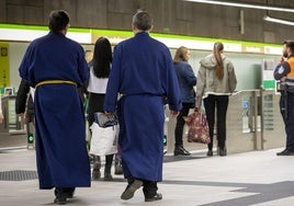 File photo of brotherhood members using Metro de Málaga.