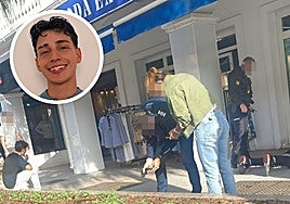 In the main picture, Fabian sits waiting for the police to take his statement while a firearm is recovered.