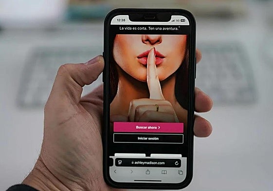 A user prepares to log onto the Ashley Madison dating website.