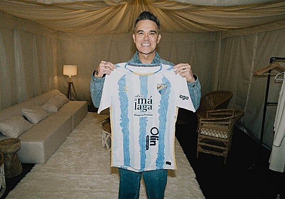 Williams with his Malaga shirt.