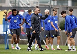 Hansi Flick with Barcelona players.