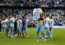 The young forward removed his shirt to celebrate his two goals.